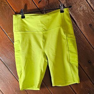 Fabletics neon powerhold bike shorts with outside pocket